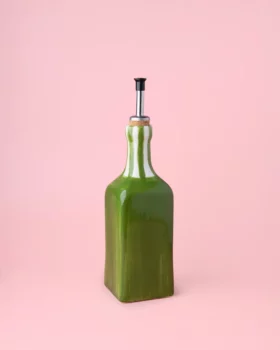 Distributeur d'huile vert et rayures